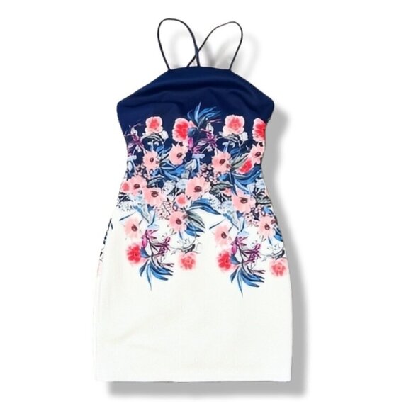A strappy back adds allure to an apron-front bodycon dress wrapped in flowers - - Picture 3 of 5